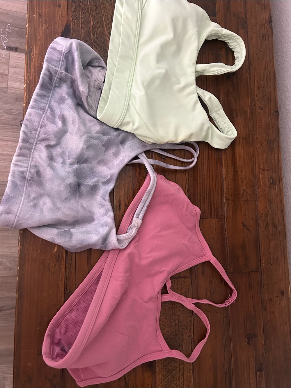 Athleta Sports Bra Trio in Pink, Light Green, Camo